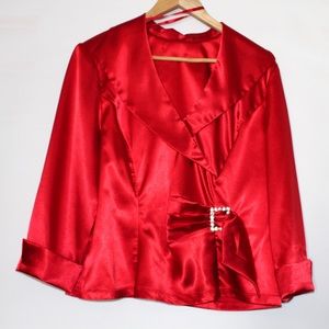 Red silky top with rhinestone buckle